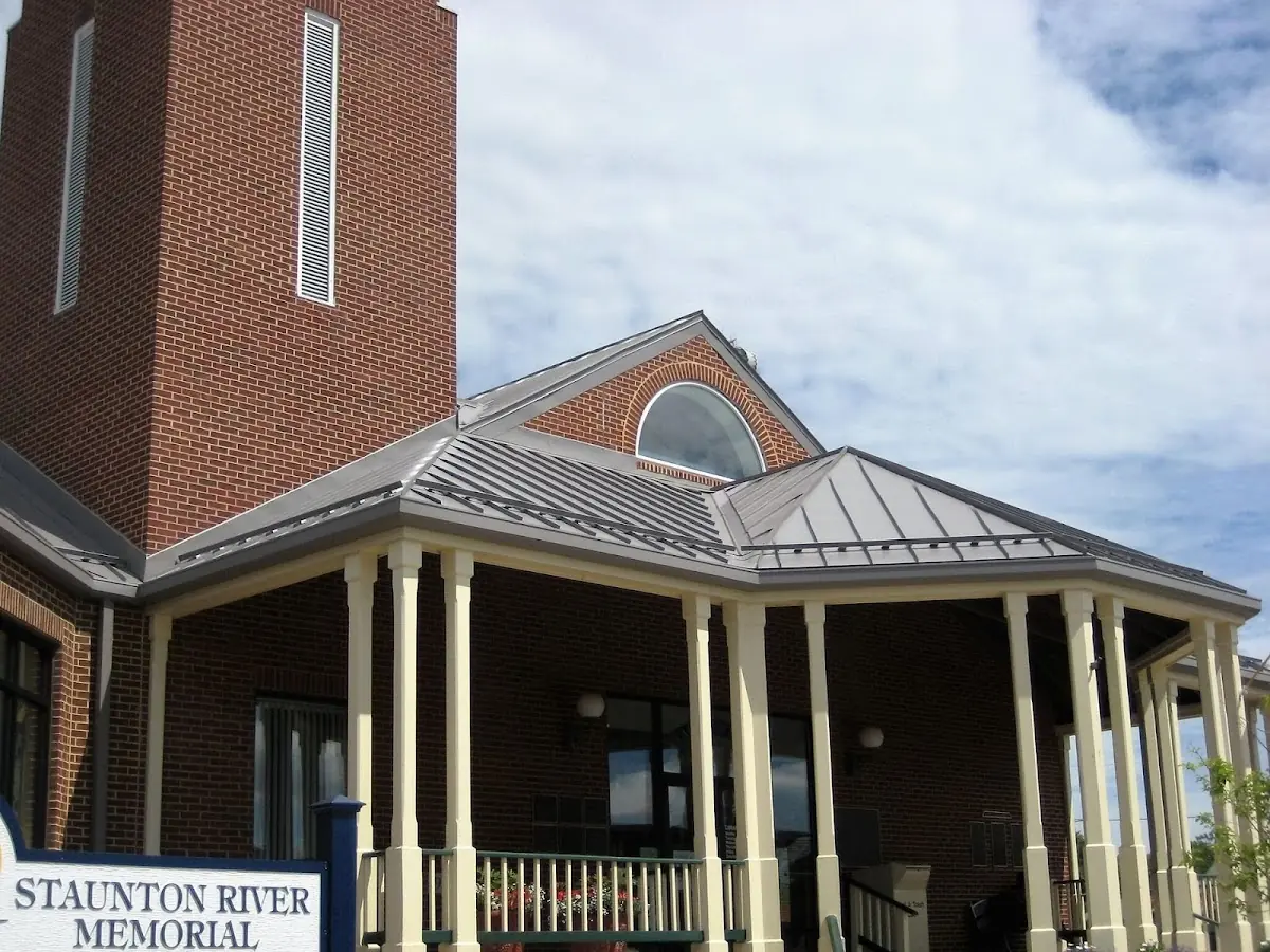Skilled roofing craftsmen working on a residential roof in Warrenton